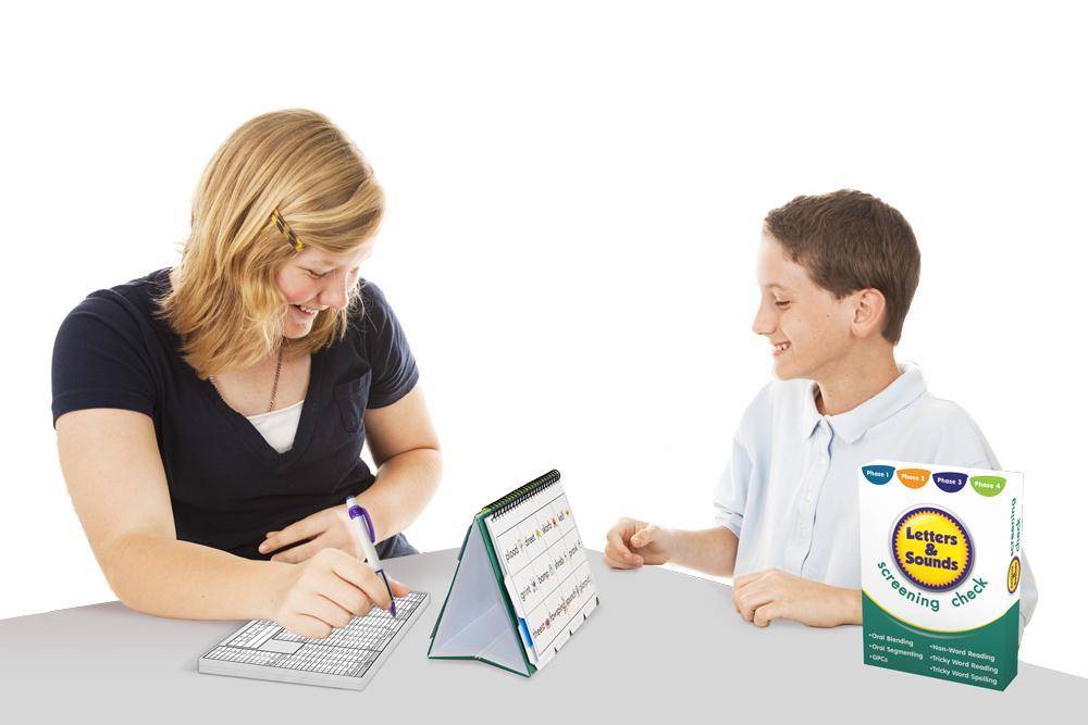 Teacher using Junior Learning JL261 Letters and Sounds Screening Check to teach a boy
