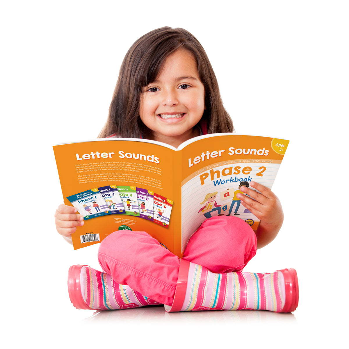 Girl using Junior Learning BB916 Phase 2 Letter Sounds Workbook - 12 Pack