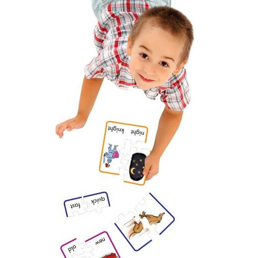 boy playing with Junior Learning JL245 Preposition Puzzles