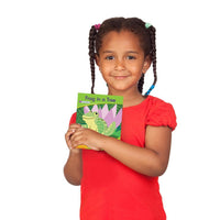 girl holding Junior Learning JL383 Letters and Sounds Phase 4 Set 1 Fiction