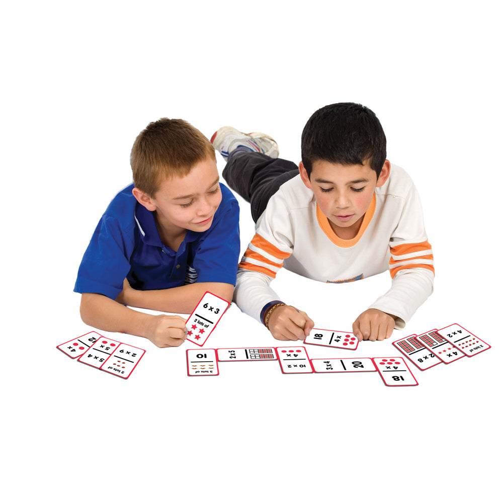 two boys playing Junior Learning JL404 factor dominoes