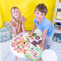 girl and boy playing with Junior Learning JL646 Food Fractions